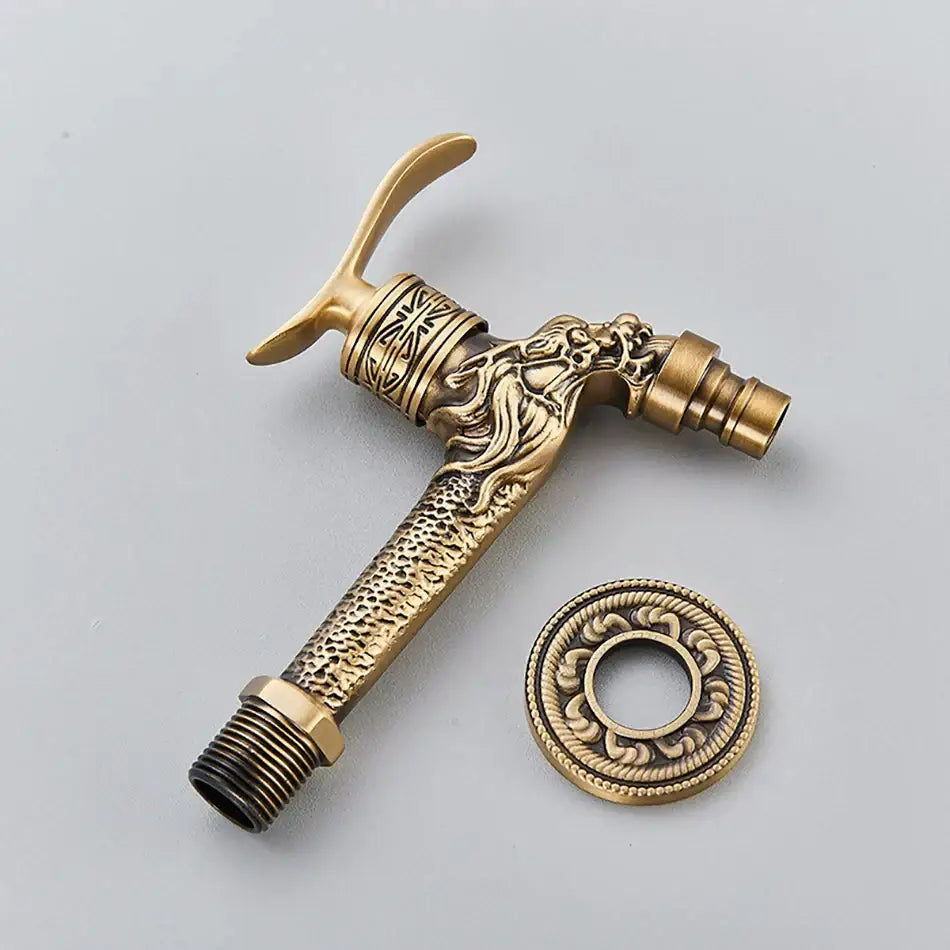 Decorbites™ antique brass wall mounted washing machine faucet with brass wall mounted dragon theme and ornate embossed detailing