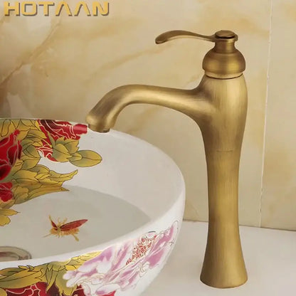 Decorbites antique brass waterfall basin faucet with single handle and tall slender spout yt-5053 in antique brass finish