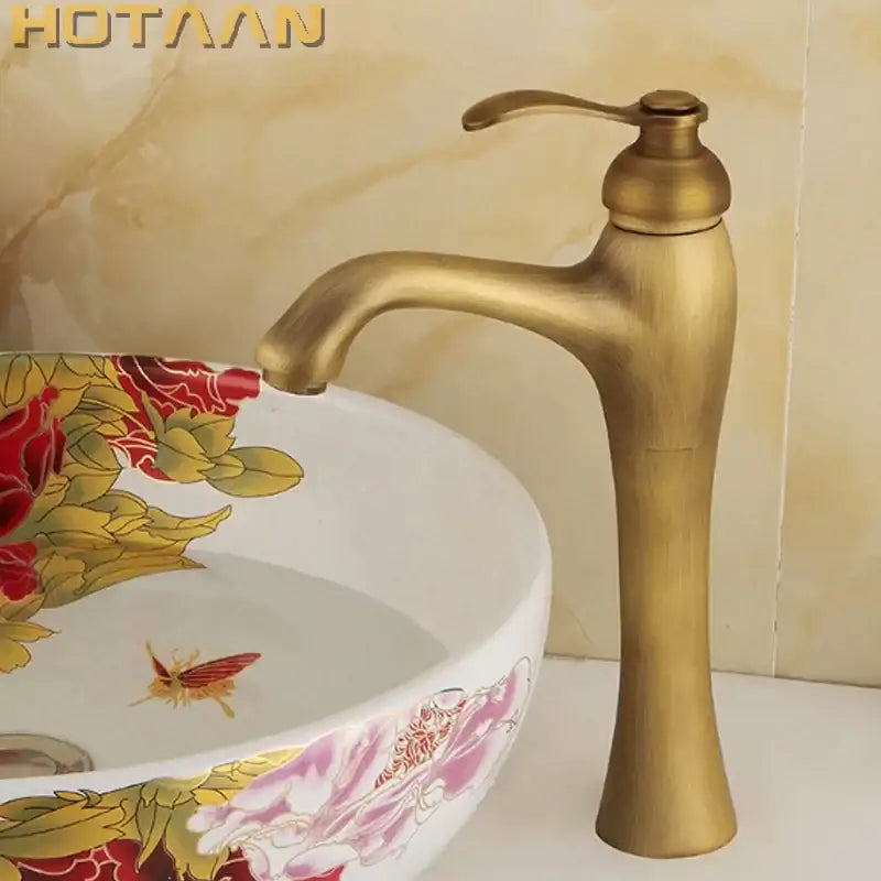 Decorbites antique brass waterfall basin faucet with single handle and tall slender spout yt-5053 in antique brass finish