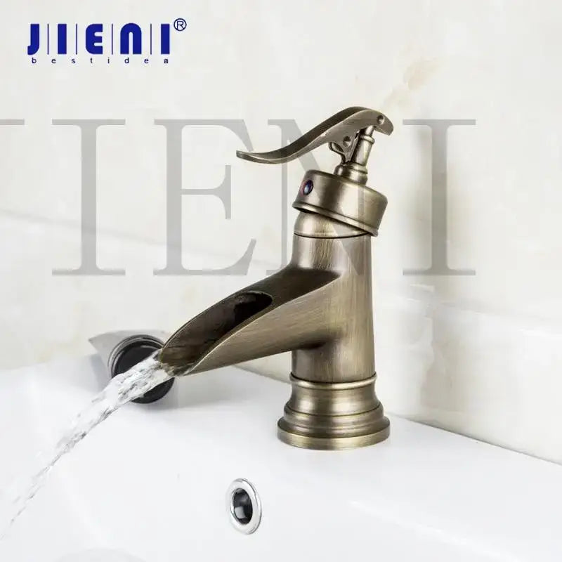 Decorbites antique brass waterfall basin faucet with sleek modern design and single lever art design handle