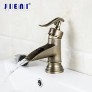 DecorBites antique brass waterfall basin faucet with jienai single-handle and art design handle for bathroom