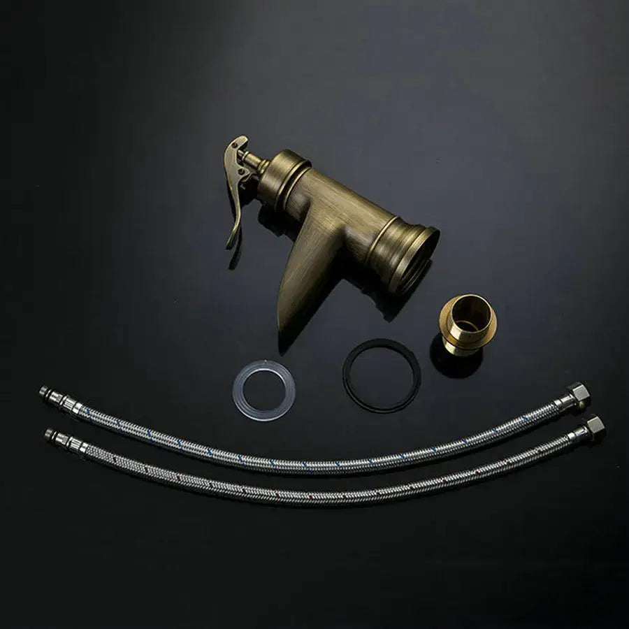 Antique brass waterfall basin faucet by decorbites featuring a sleek curved spout and art design lever handle