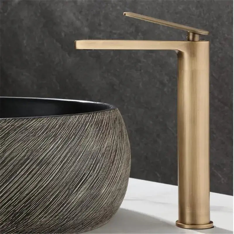 DecorBites™ antique bronze basin faucet with brass finish, sleek tall spout, minimalist deck mounted mixer tap for bathroom sink