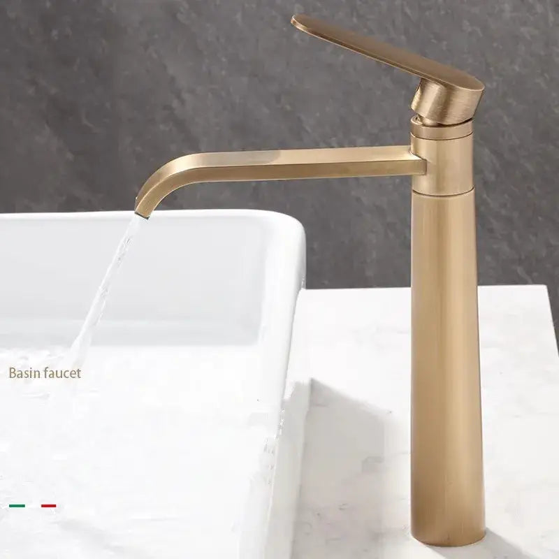 Decorbites™ antique bronze basin faucet with sleek gold-toned brass design and tall cylindrical body for hot and cold use