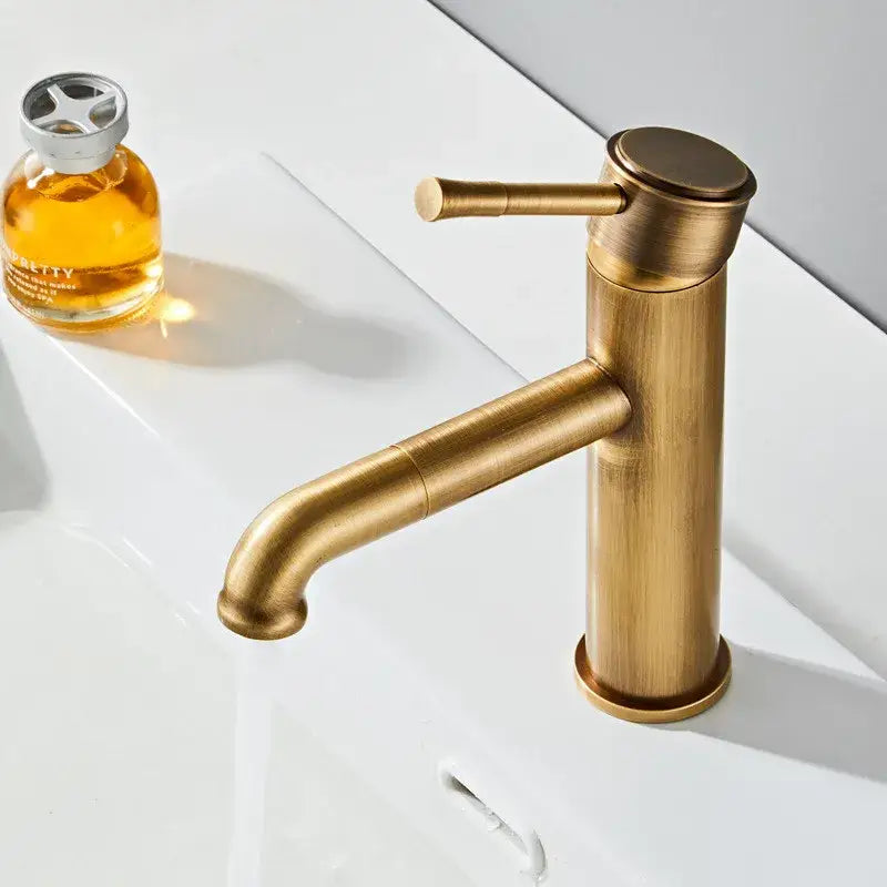 Brass-finished antique bronze basin faucet with single handle and curved spout for deck mounted sink mixer tap