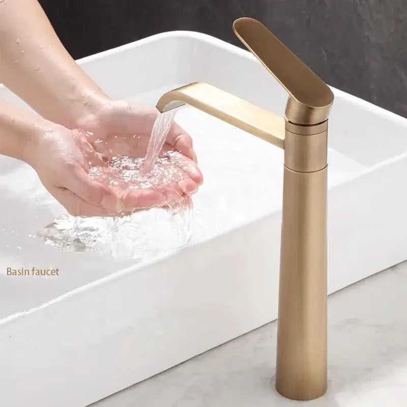 Modern gold-toned basin faucet with sleek minimalist design from decorbites antique bronze basin faucet collection