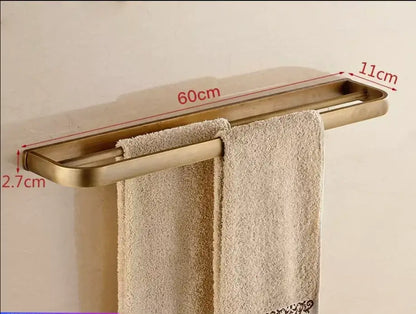 Gold-toned rectangular wall-mounted towel rack 60cm long from DecorBites antique bronze bathroom accessory set