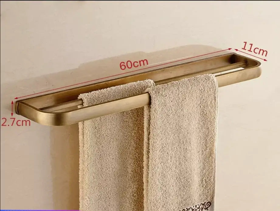 Gold-toned rectangular wall-mounted towel rack 60cm long from DecorBites antique bronze bathroom accessory set
