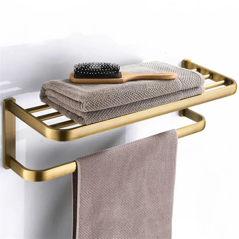 Brass-finished double-tier towel rack with integrated hanging bar in antique bronze bathroom accessory set by decorbites
