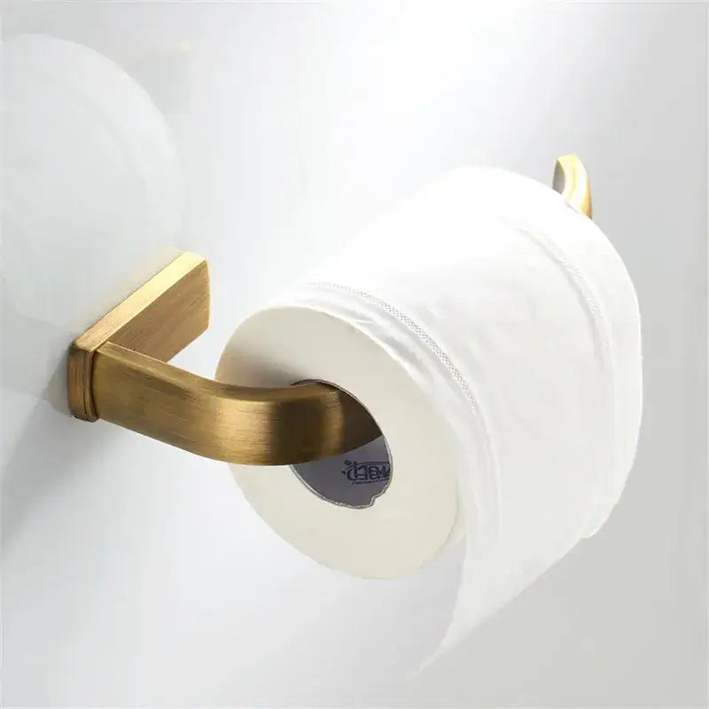 Decorbites antique bronze bathroom brass toilet paper holder with sleek curved design holding white roll