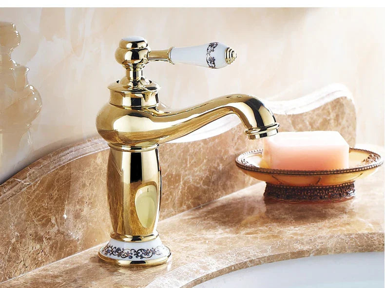 DecorBites™ antique bronze single handle bathroom faucet with gold finish white ceramic handle and matching floral base real shot details