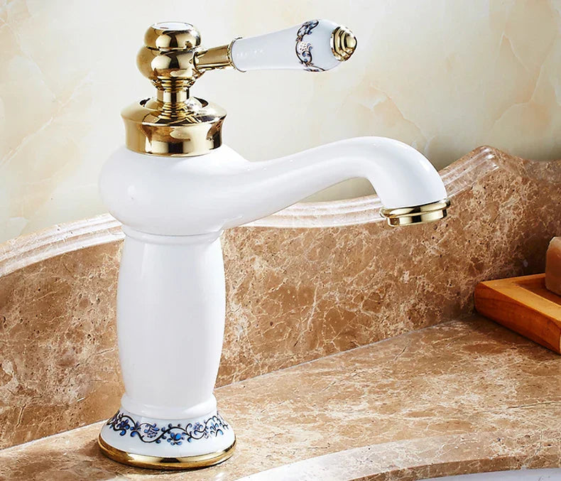 DecorBites antique bronze single handle bathroom faucet with white ceramic, gold accents, and blue floral real shot details