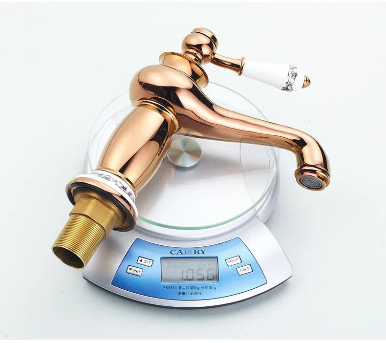 Decorbites antique bronze single handle bathroom faucet with polished rose gold finish and ceramic handle real shot details