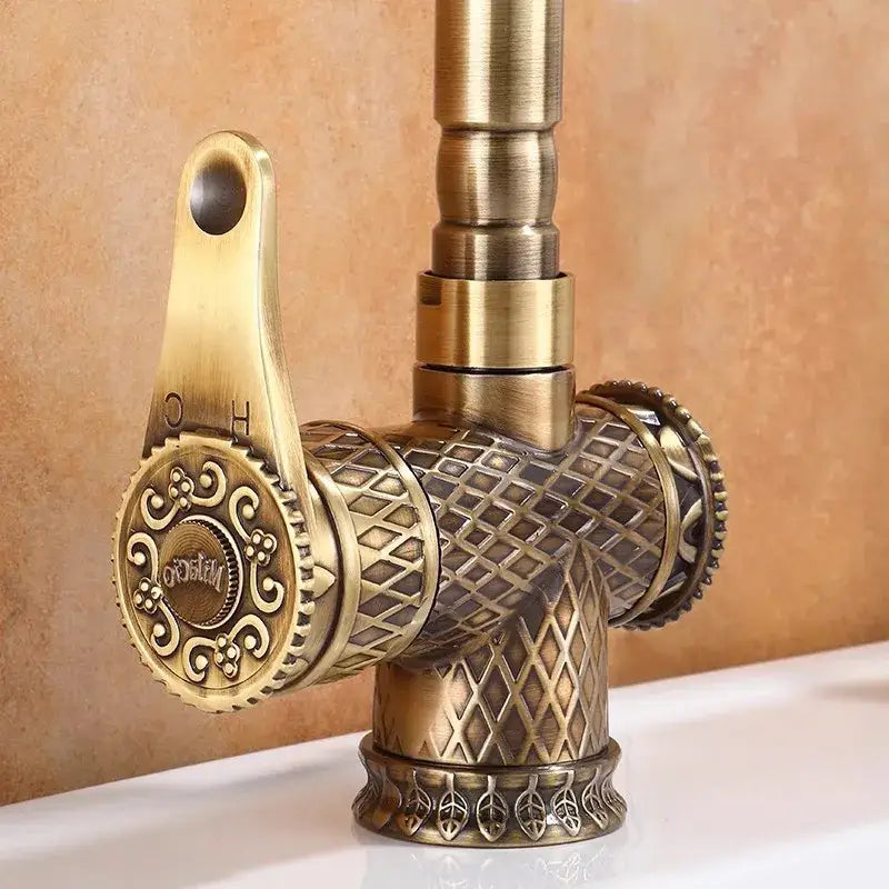 DecorBites antique bronze bathroom sink faucet with brass finish, ornate diamond pattern, and decorative leaf motifs