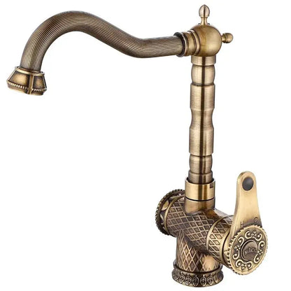 Decorbites antique bronze bathroom sink faucet with ornate ribbed spout and diamond patterned base in antique bronze finish