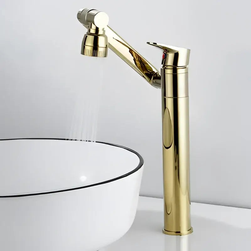 Decorbites antique bronze bathroom sink faucet with a gold curved spout and pull-down spray head deck mounted mixer