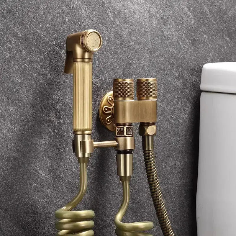 Decorbites™ antique bronze bidet sprayer set with brass finish ornate detailing and coiled hose for high pressure use