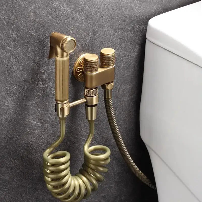 Decorbites™ antique bronze bidet sprayer set with brass wall-mounted sprayer, coiled hose, and textured knobs for high pressure use