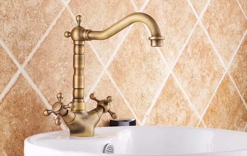Antique bronze brass basin faucet with ornate cross handles and curved spout by decorbites for kitchen use
