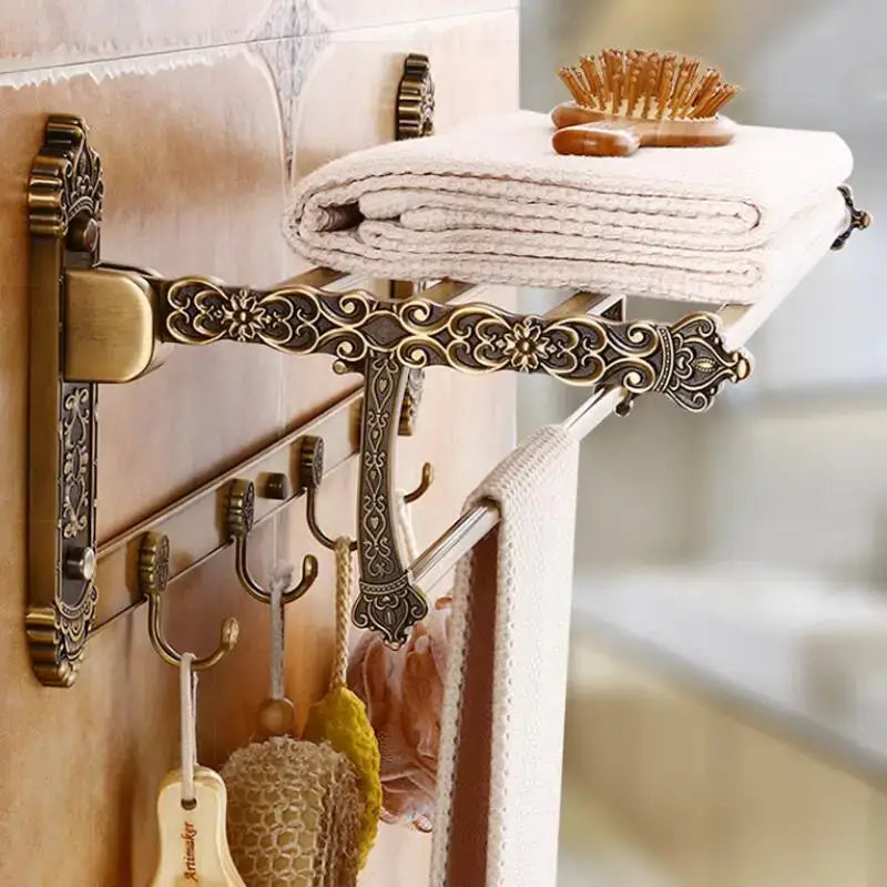 Antique bronze carved aluminum towel rack with ornate floral patterns and multiple hooks for bathroom use
