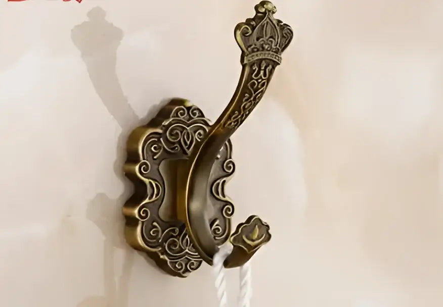DecorBites™ antique bronze carved aluminum wall-mounted hook with intricate crown and scrollwork design for bathroom use