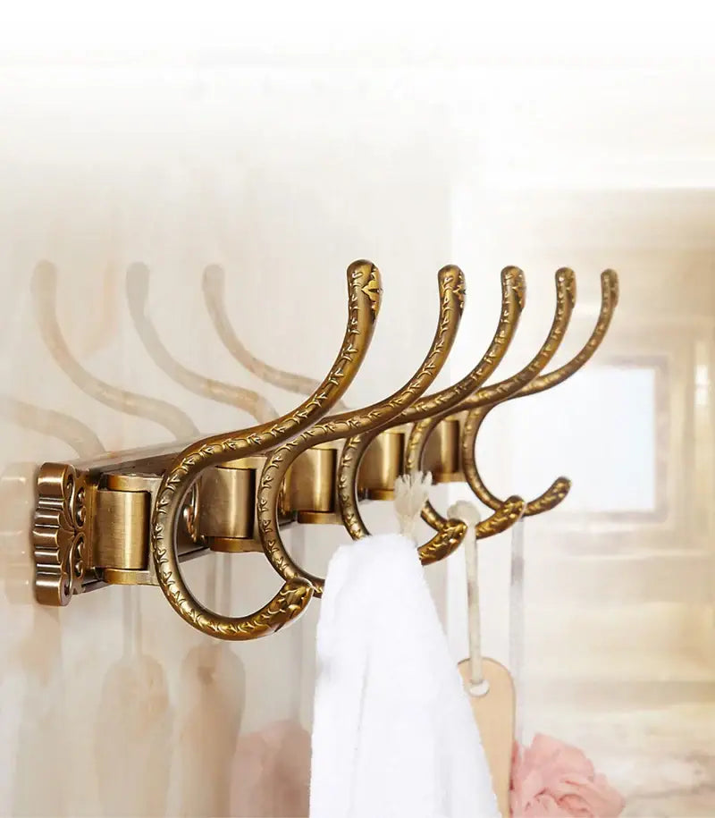 Antique bronze carved robe hook with ornate brass wall-mounted hooks and decorative scrollwork for bathroom and kitchen