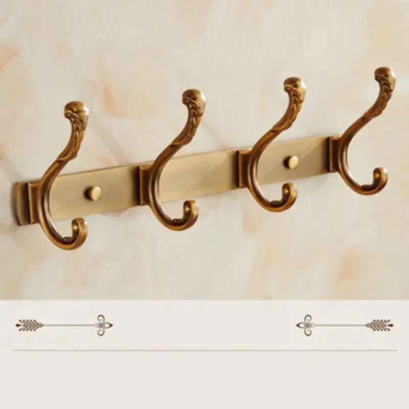 Antique bronze carved wall-mounted robe hook with four ornate scrolled hooks for bathroom and kitchen use