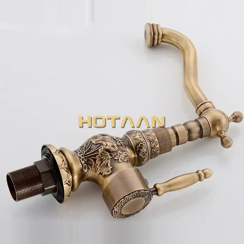 DecorBites antique bronze kitchen basin faucet with ornate floral embossing, curved spout, and dual lever handles