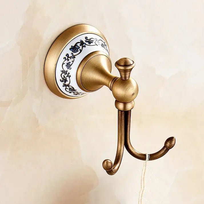 DecorBites antique bronze ceramic robe hook with white ceramic backplate and blue floral patterns for wall mounting