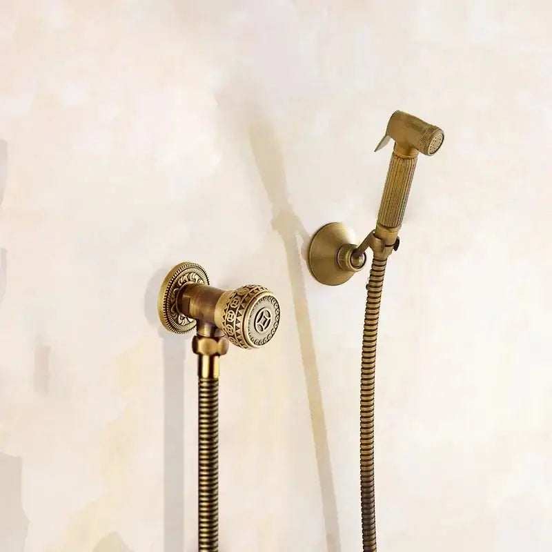 Decorbites™ antique bronze douche bidet sprayer set with ornate vintage-style faucet and ribbed handheld showerhead