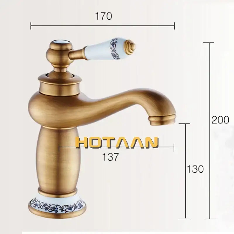 DecorBites™ antique bronze single handle basin faucet with brass finish and white ceramic handle featuring blue floral patterns