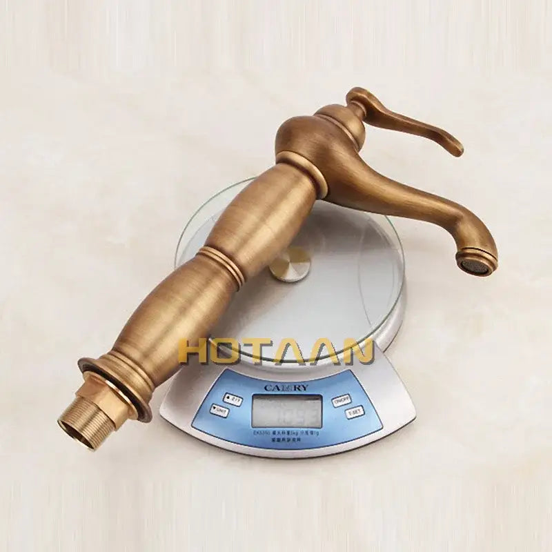 Decorbites antique bronze tall basin faucet with antique brass finish, solid copper mixer, and elongated spout design