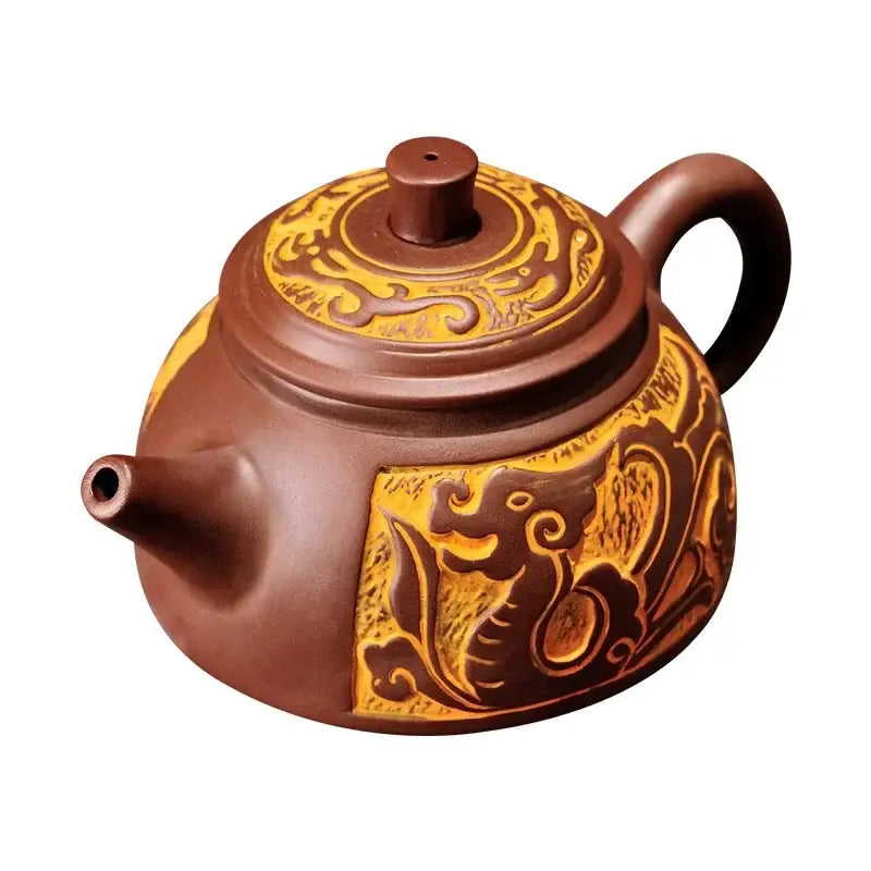Brown ceramic antique bronze teapot set with intricate golden dragon and cloud motifs in mine purple mud yixing clay