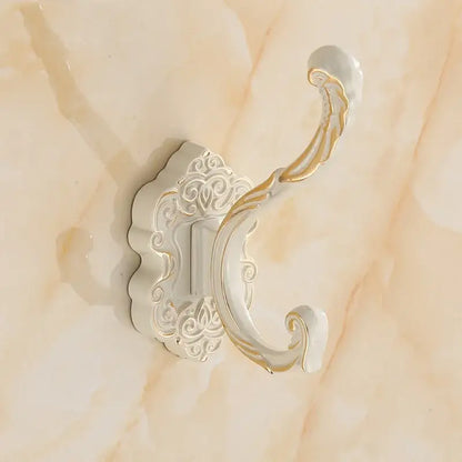 White and gold ornate wall hook with intricate scrollwork design for clothes towel coat in antique bronze wall hooks rack