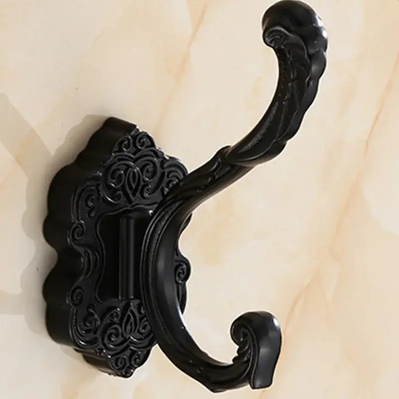 DecorBites™ black ornate metal wall hook with intricate scrollwork in antique bronze wall hooks for clothes towels and coats