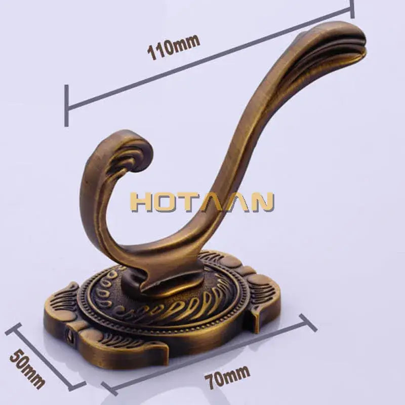 Decorbites antique bronze wall hooks feature an ornate brass-colored design for towels coats and robes