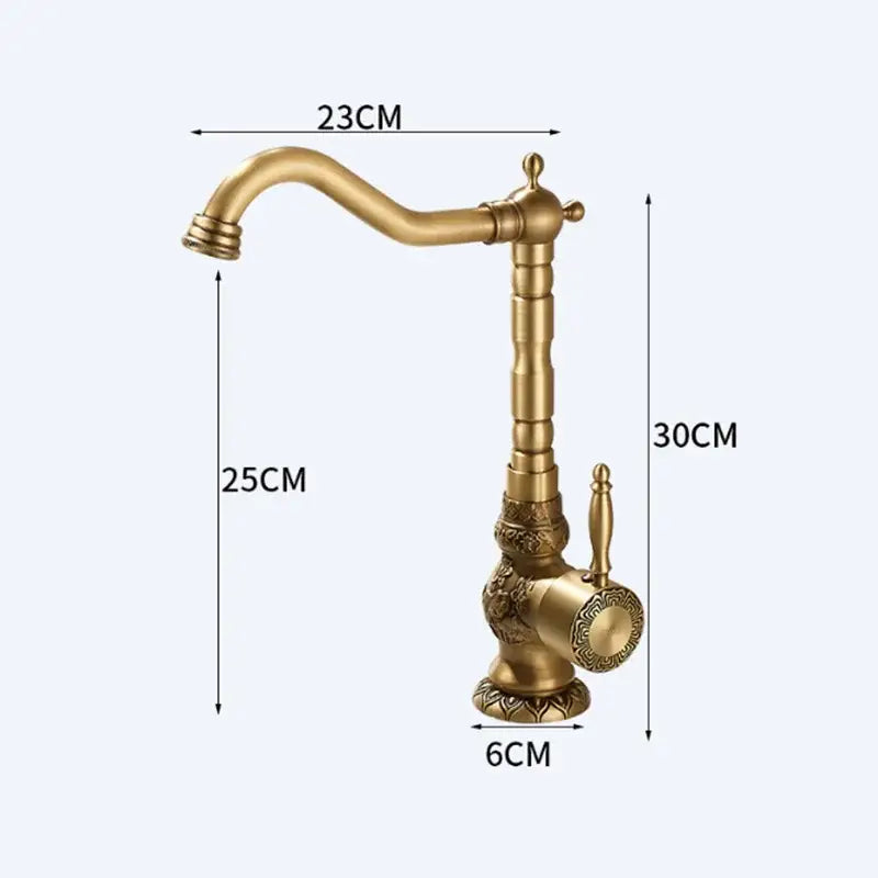 DecorBites™ antique carved brass bathroom sink faucet with ornate detailing and curved spout for hot and cold mixer