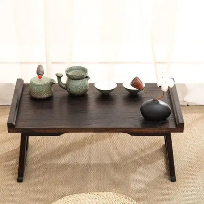 Dark wood solid wood foldable table with matte finish and sturdy legs for hanfu shoots and tea cooking by decorbites