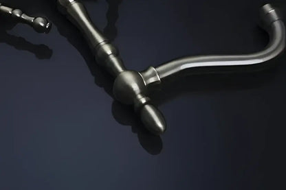 Antique-style silver faucet with ornate turned-metal spout and handle in decorbites antique copper brass finish