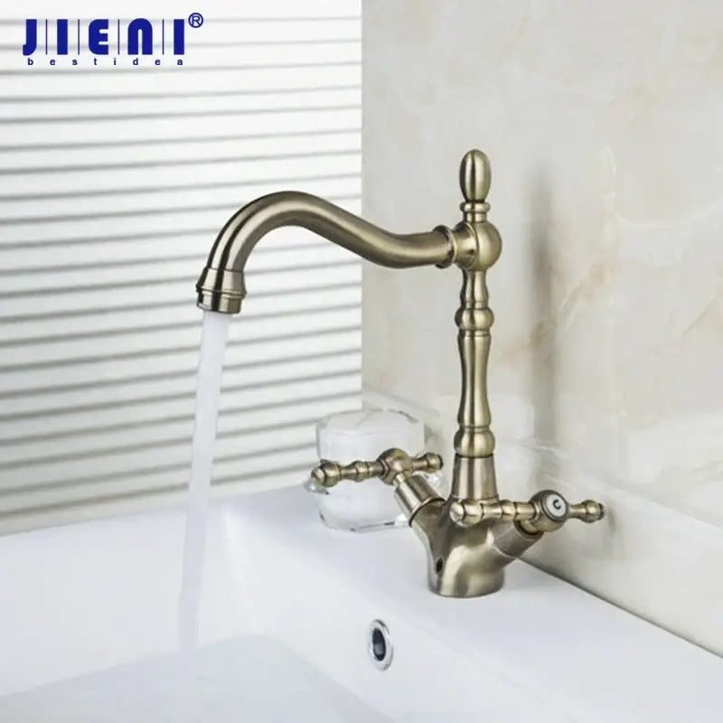 Decorbites™ antique copper brass kitchen swivel faucet mixer tap with ornate turned spout and cross-handle design