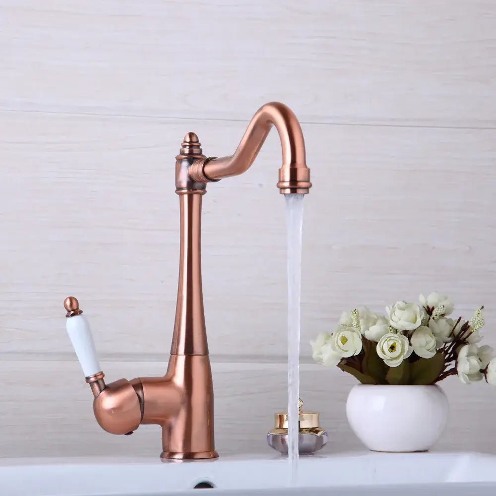 DecorBites™ antique copper kitchen basin mixer tap with copper finish, white ceramic handle, and elegant curved spout
