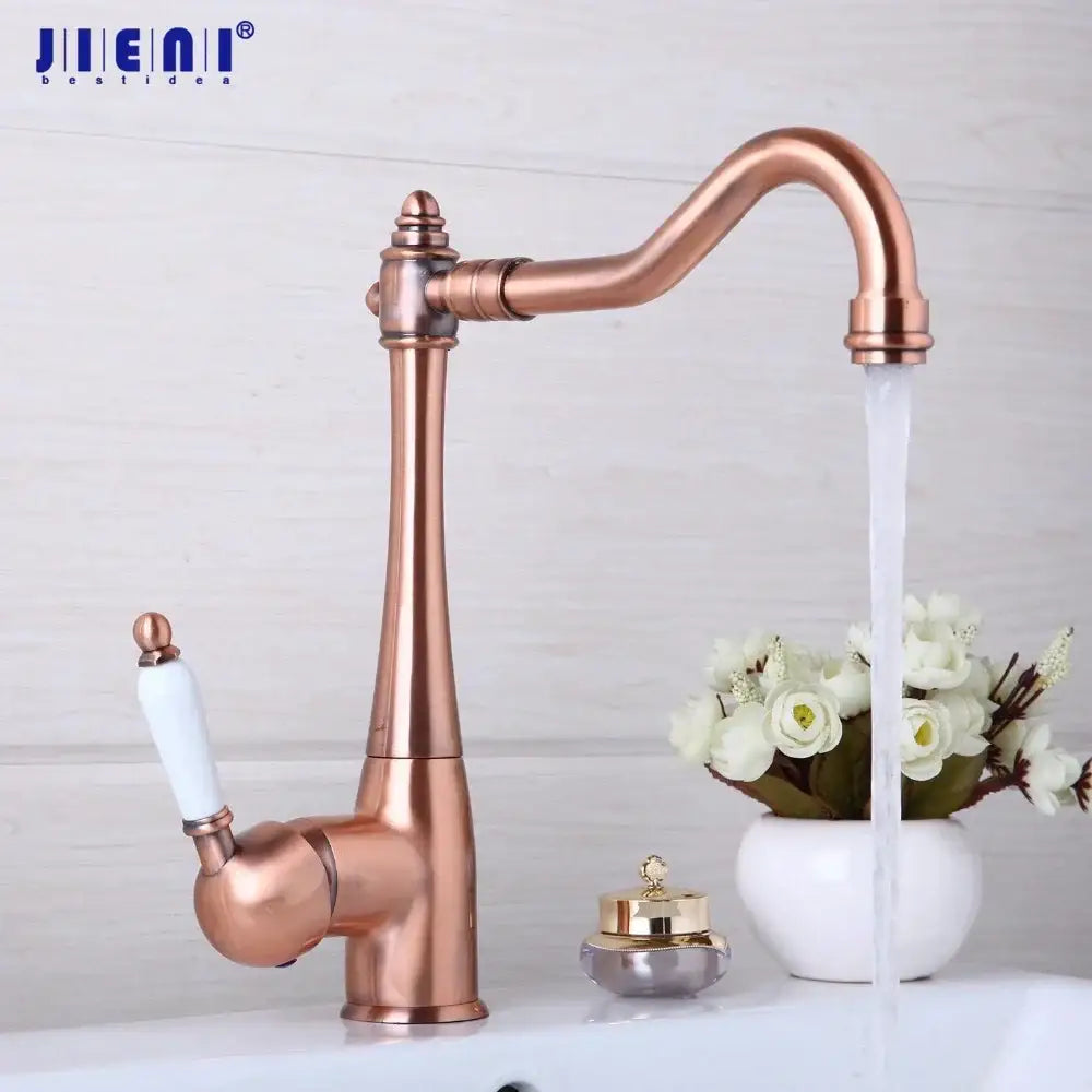 Decorbites™ antique copper basin mixer tap with copper finish and white ceramic handle in vintage design