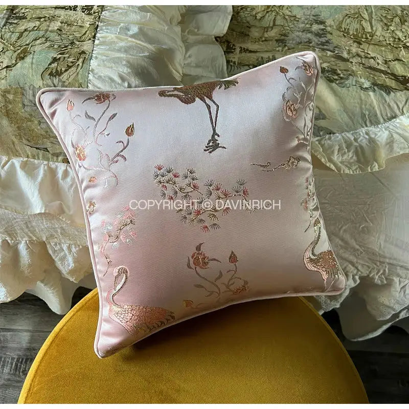 Soft pink satin pillow case with antique crane floral jacquard embroidery in gold and rose-gold thread