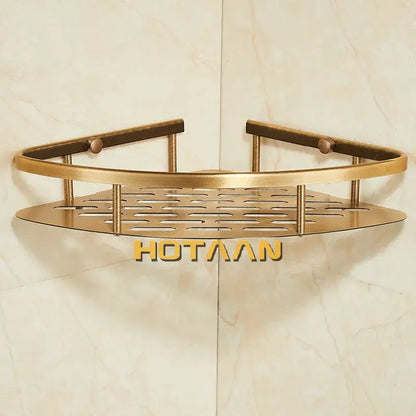 Brass-colored antique finish aluminum shower basket with perforated design and rounded edges for bathroom storage