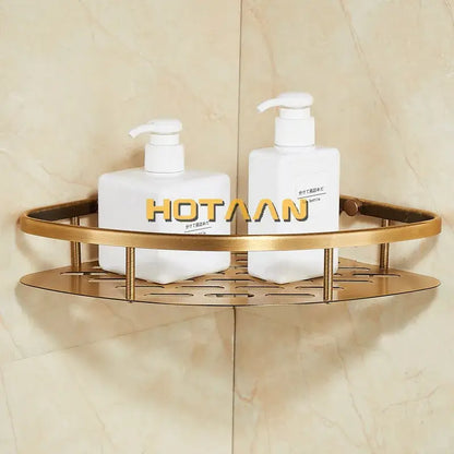 Gold-toned metal corner shower caddy with antique finish aluminum and perforated base for aluminum shower basket use