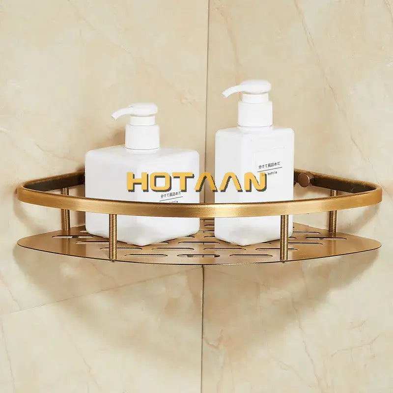 Gold-toned metal corner shower caddy with antique finish aluminum and perforated base for aluminum shower basket use