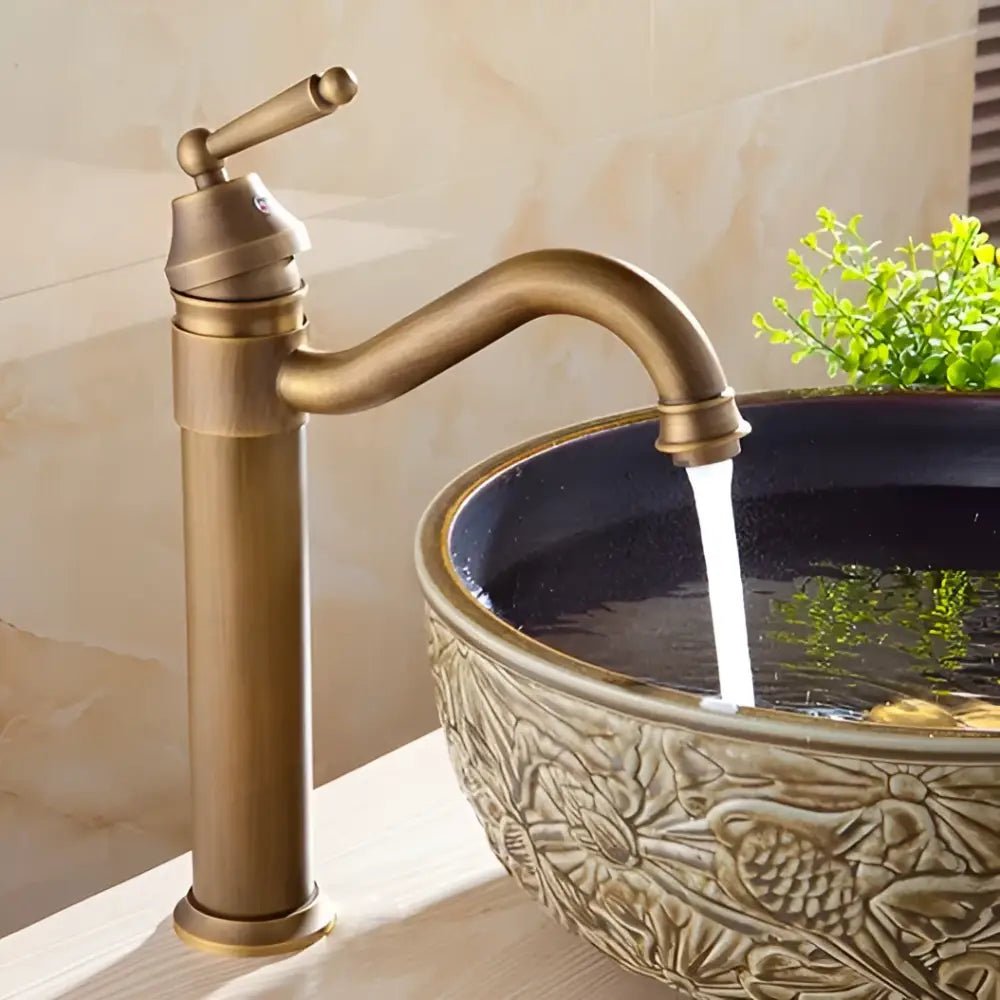 Decorbites antique finish brass basin faucet with single handle and curved spout for bathroom vanity sink mixer