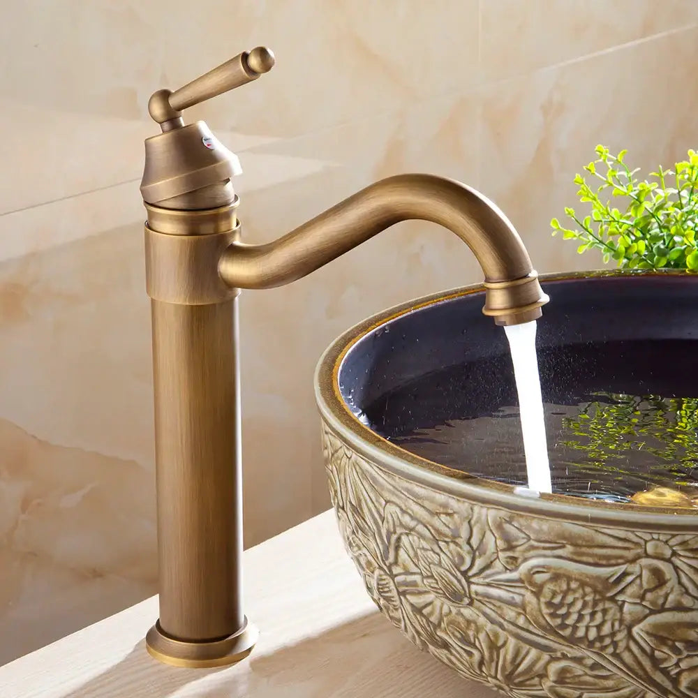 Decorbites antique finish brass basin faucet with tall single handle and curved spout for bathroom vanity sink mixer