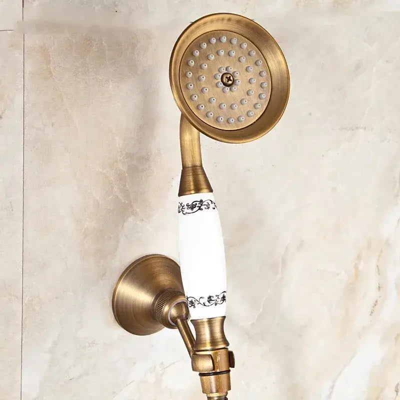 Decorbites™ antique gold handheld shower head with antique brass finish and white ceramic handle with black patterns