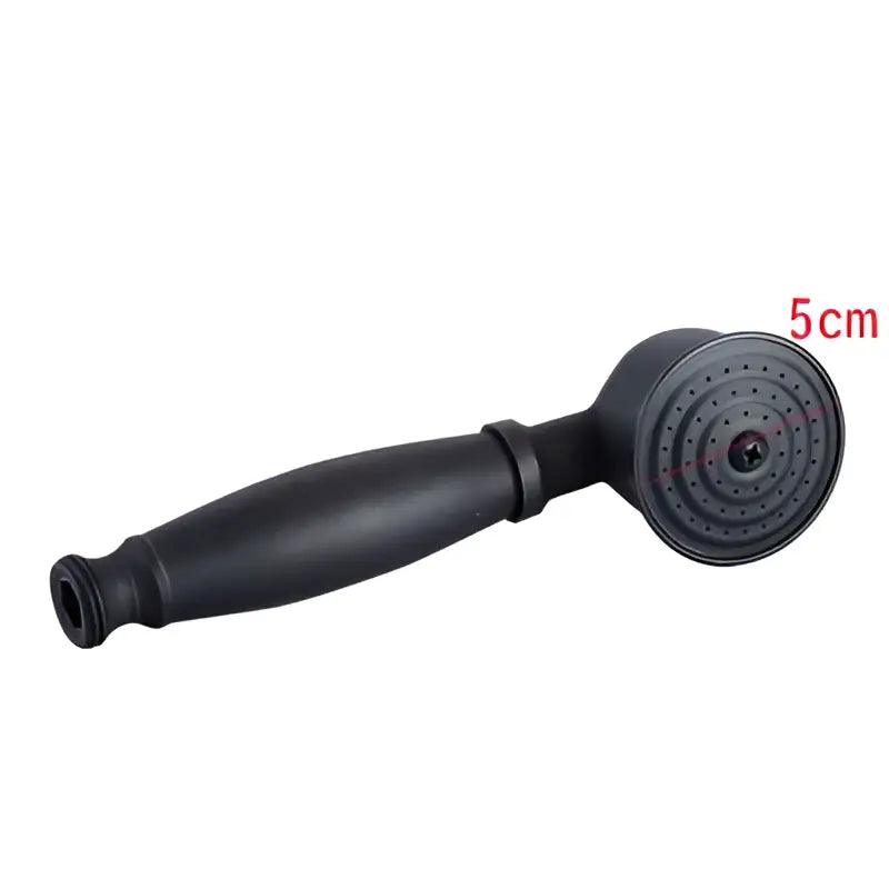 DecorBites™ antique gold handheld shower head with holder and plumbing hose featuring black matte finish and textured grip